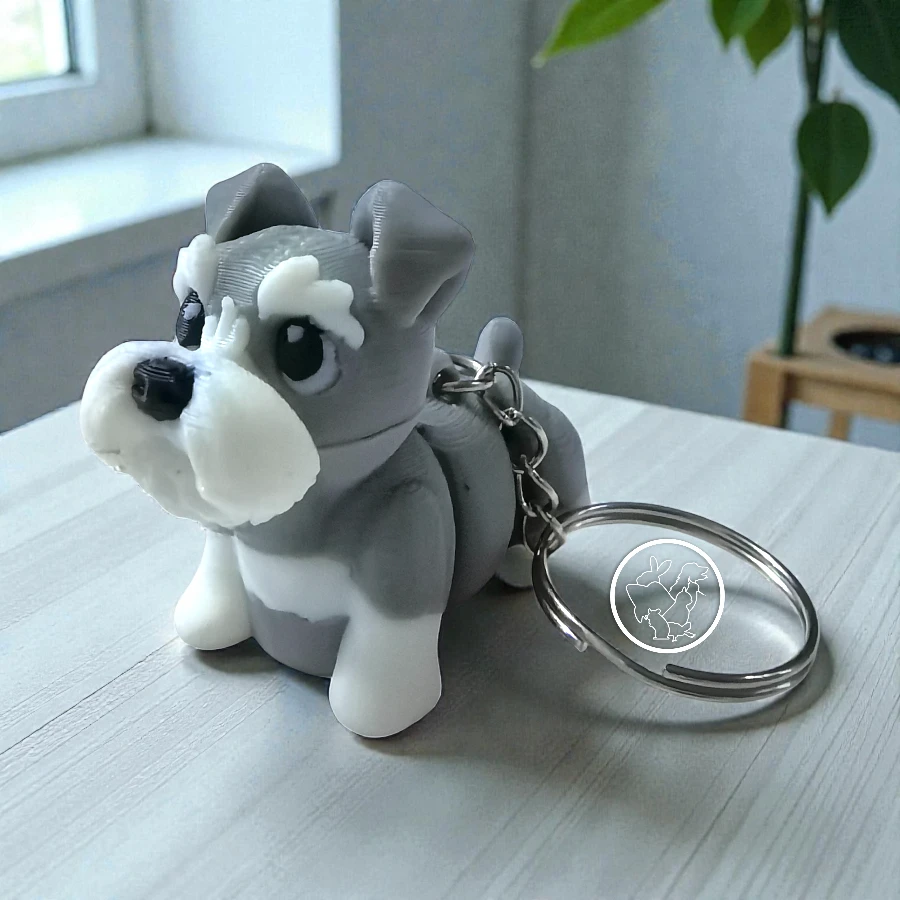 Llavero 3D de Schnauzer articulado gris con blanco