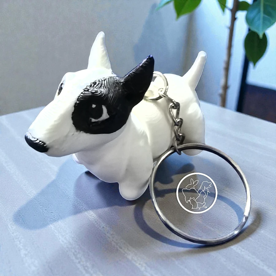 Llavero 3D de bull terrier articulado blanco con mancha