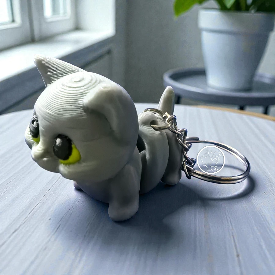 Llavero 3D de gato articulado gris