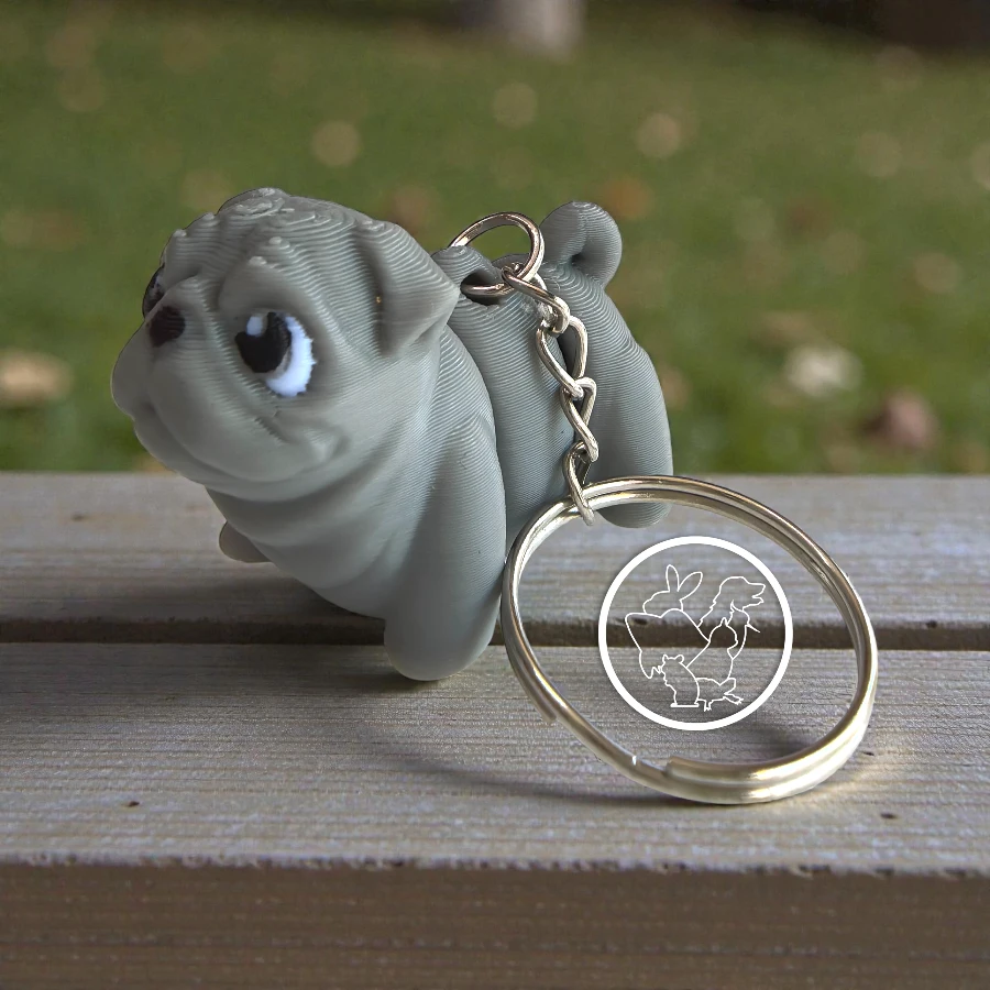 Llavero 3D de pug articulado gris