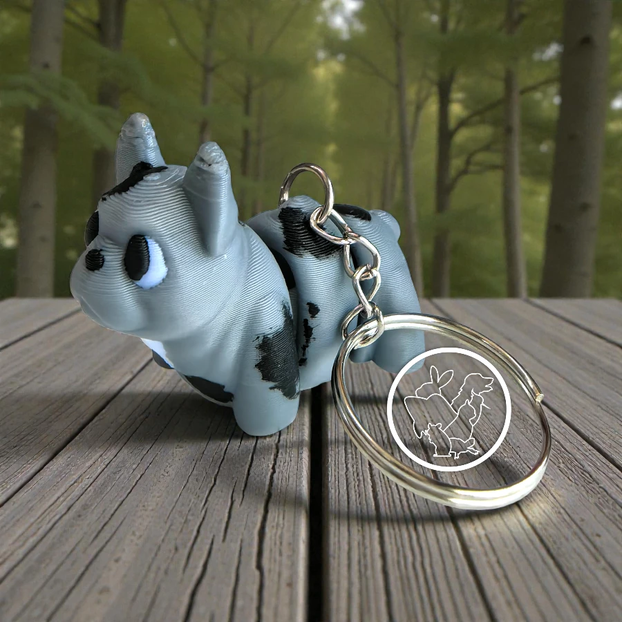 Llavero 3D de bulldog frances articulado gris con blanco manchas negras