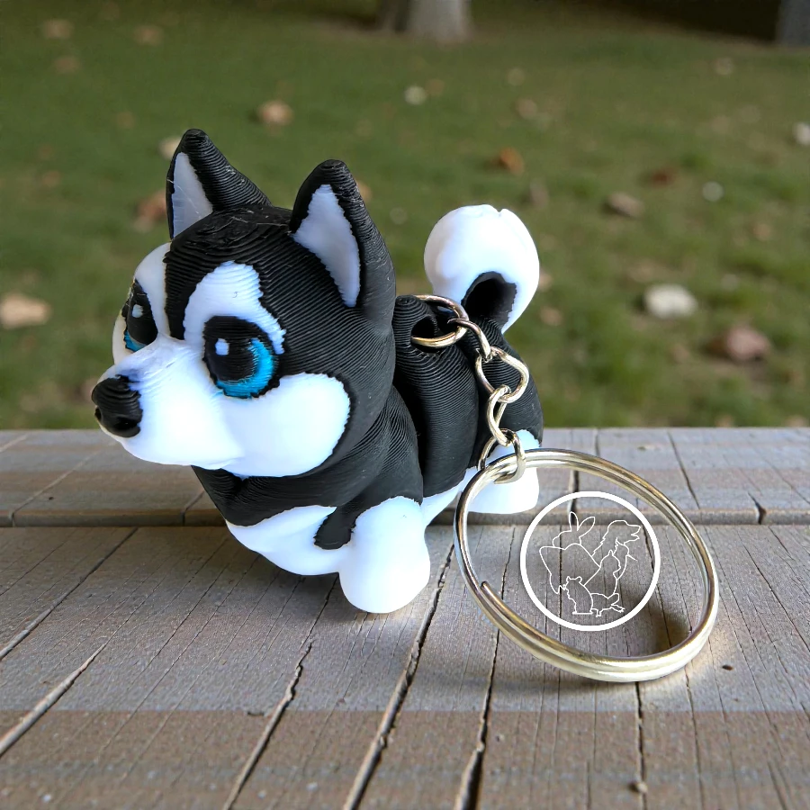 Llavero 3D de husky siberanio articulado blanco con negro ojo azul