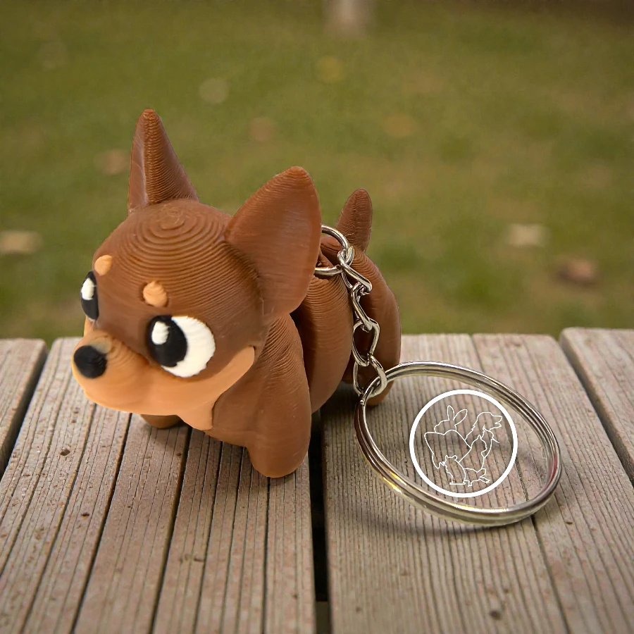 Llavero 3D de Chihuahua articulado blanco con cafe