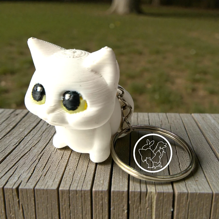 Llavero 3D de gato articulado blanco