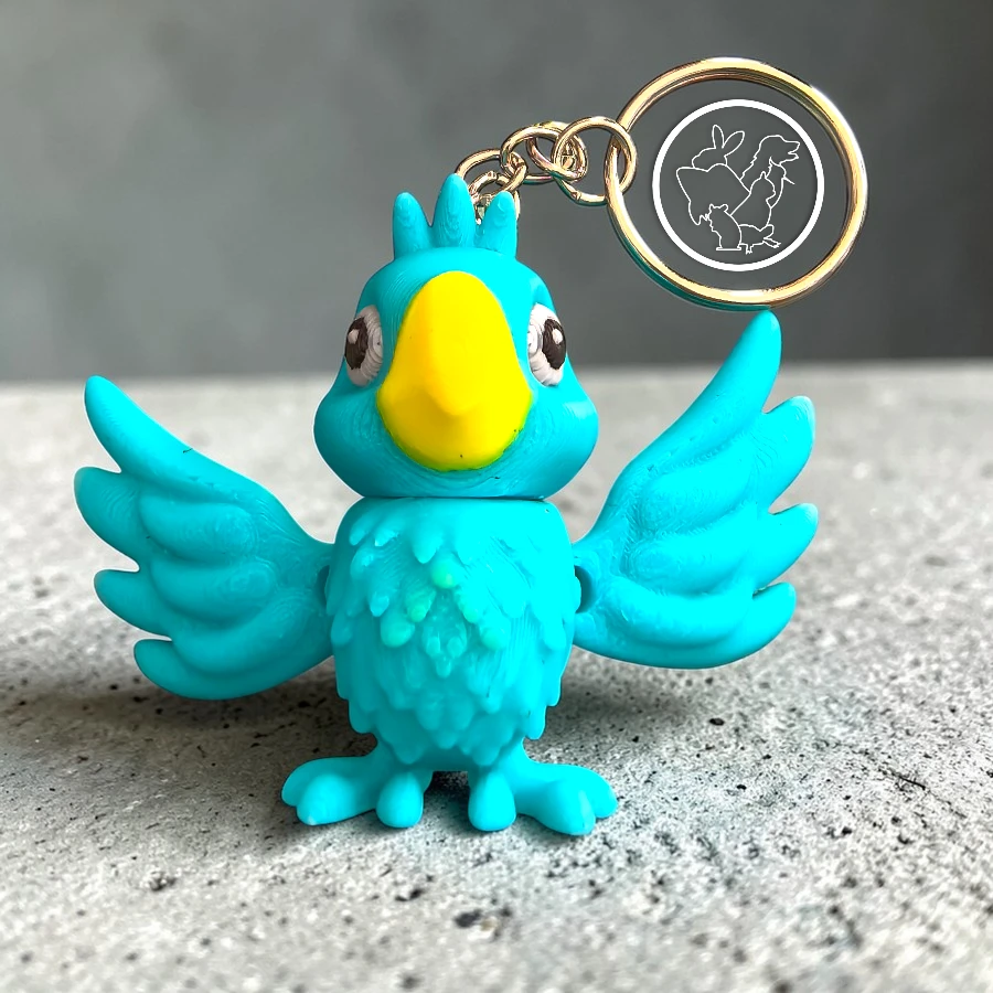 Llavero 3D de loro azul articulado